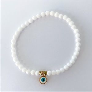 Dainty evil eye natural stone bracelet. One size